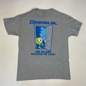 Pixar DISNEY Monsters Inc We Scare Because We Care Graphic T-shirt Men Large